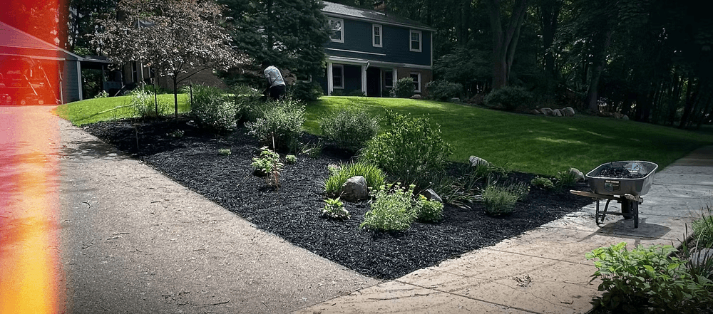 Garden Bed Refresh with Black Mulch in Kalamazoo