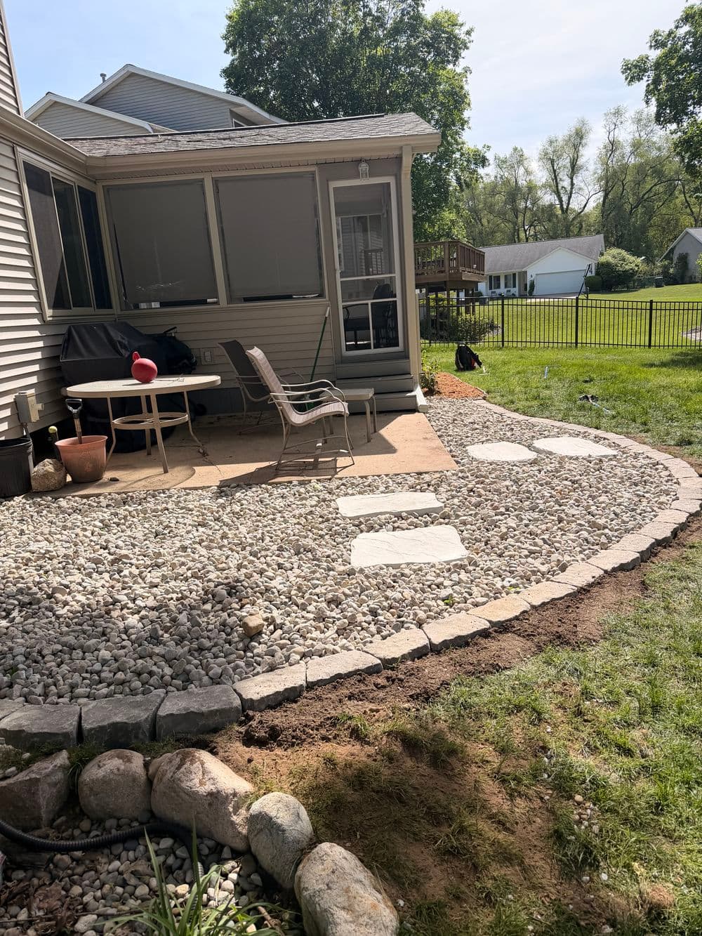 Gallery photos for Patio Extension with Flagstone, River Rock and Paver Edging in Kalamazoo: Image #1