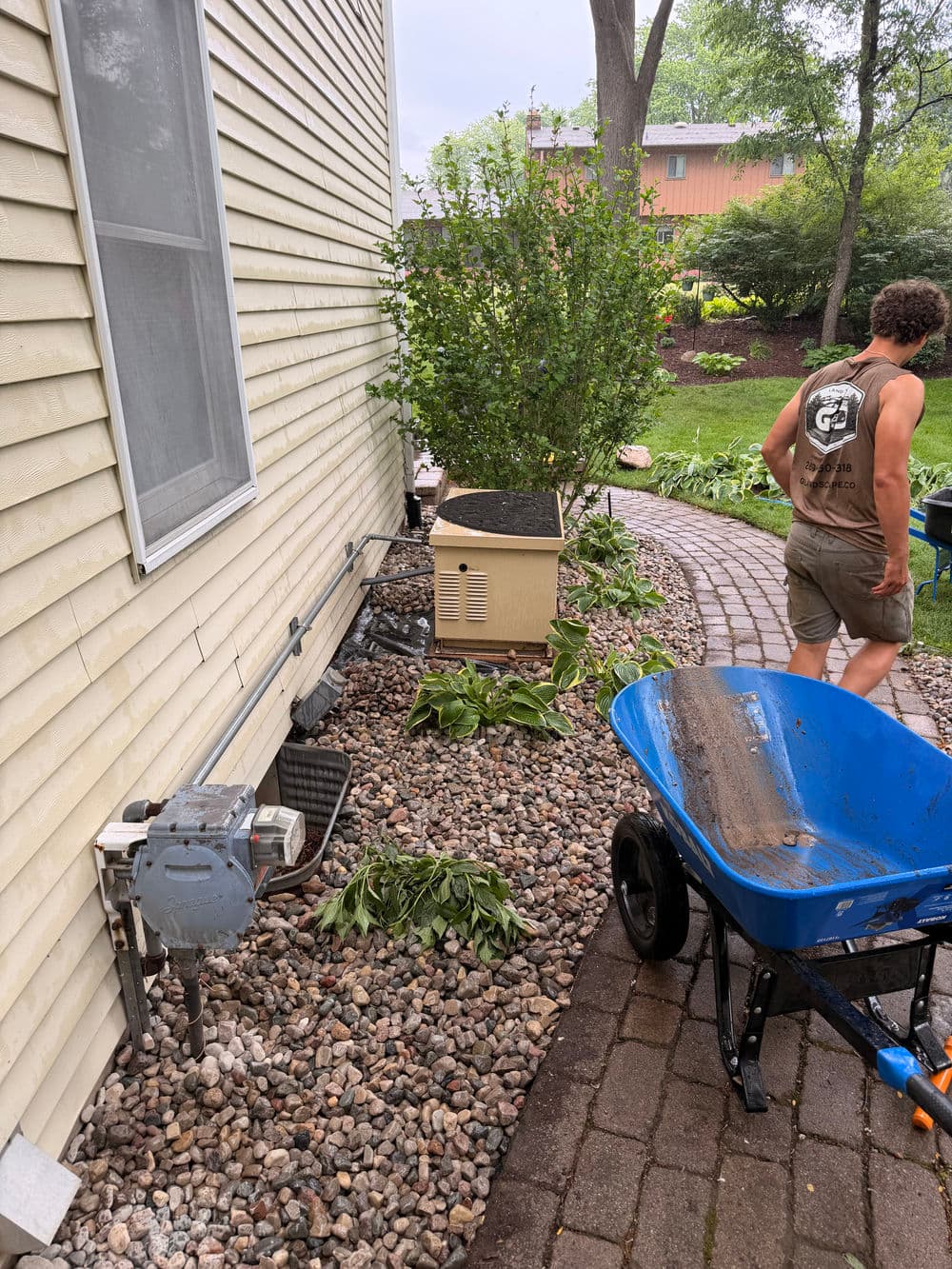 Gallery photos for Full Garden Bed Redesign with River Rock and Metal Edging in Portage: Image #6