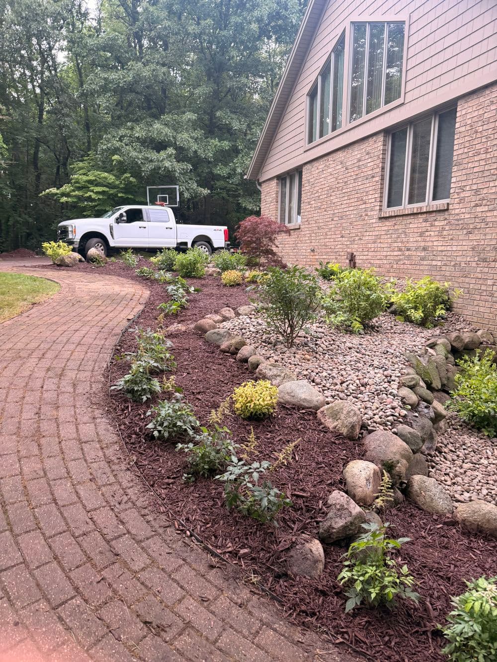 Gallery photos for Full Garden Bed Overhaul with Boulders and New Plantings in Kalamazoo: Image #1