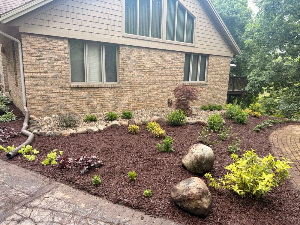 Gallery photos for Full Garden Bed Overhaul with Boulders and New Plantings in Kalamazoo: Image #2