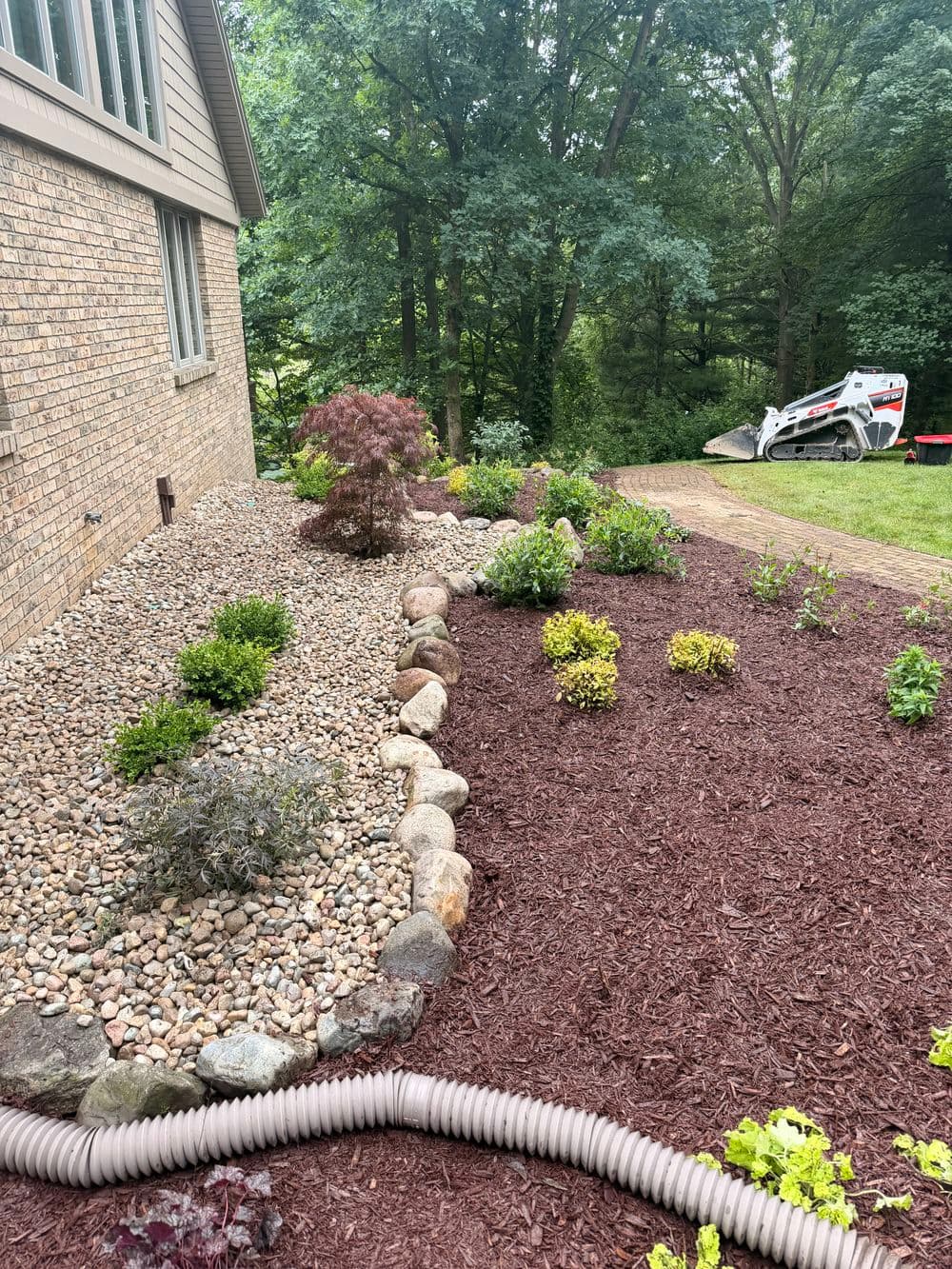 Gallery photos for Full Garden Bed Overhaul with Boulders and New Plantings in Kalamazoo: Image #4